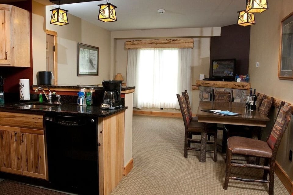 The beautiful open plan living area is great for enjoying meals with your group at the dining area