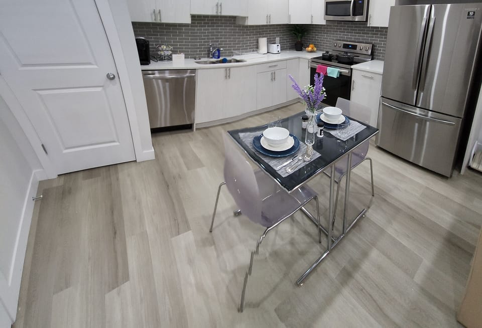 Bright kitchen and dining area. Extra dining chairs provided on request