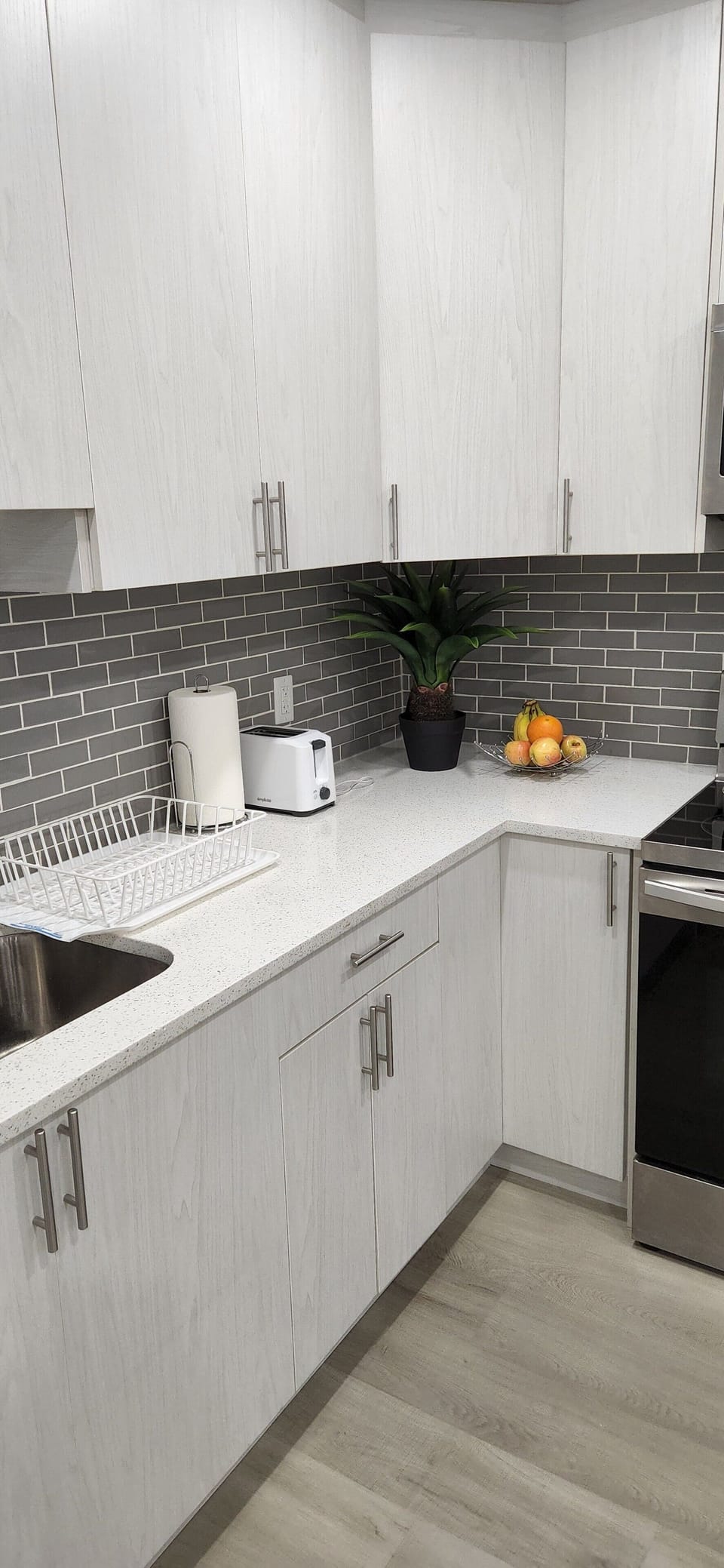 Lots of counter, storage spaces, and a complimentary fruit tray for you
