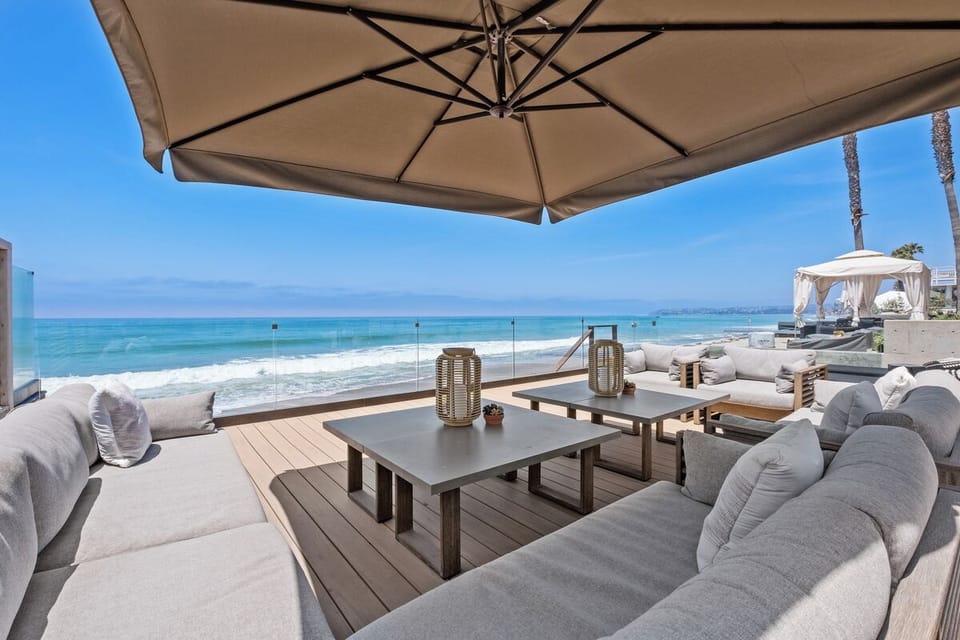 Watch the waves come right to the glass at high tide and see dolphins and more