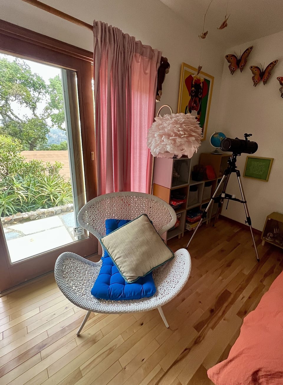 Bedroom 2. Retro  White Butterfly Chair. Great For Reading an Evening Book. 