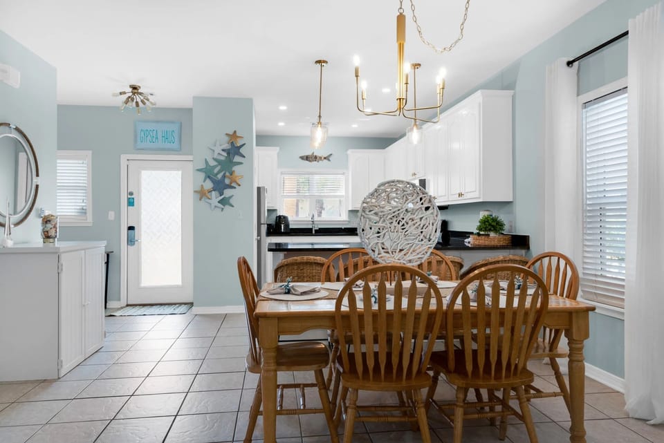 Dining area looking into kitchen and front door 