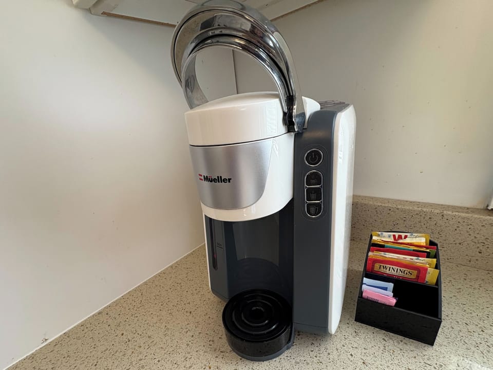 Keurig. 8-10 pods, sweeteners and tea provided