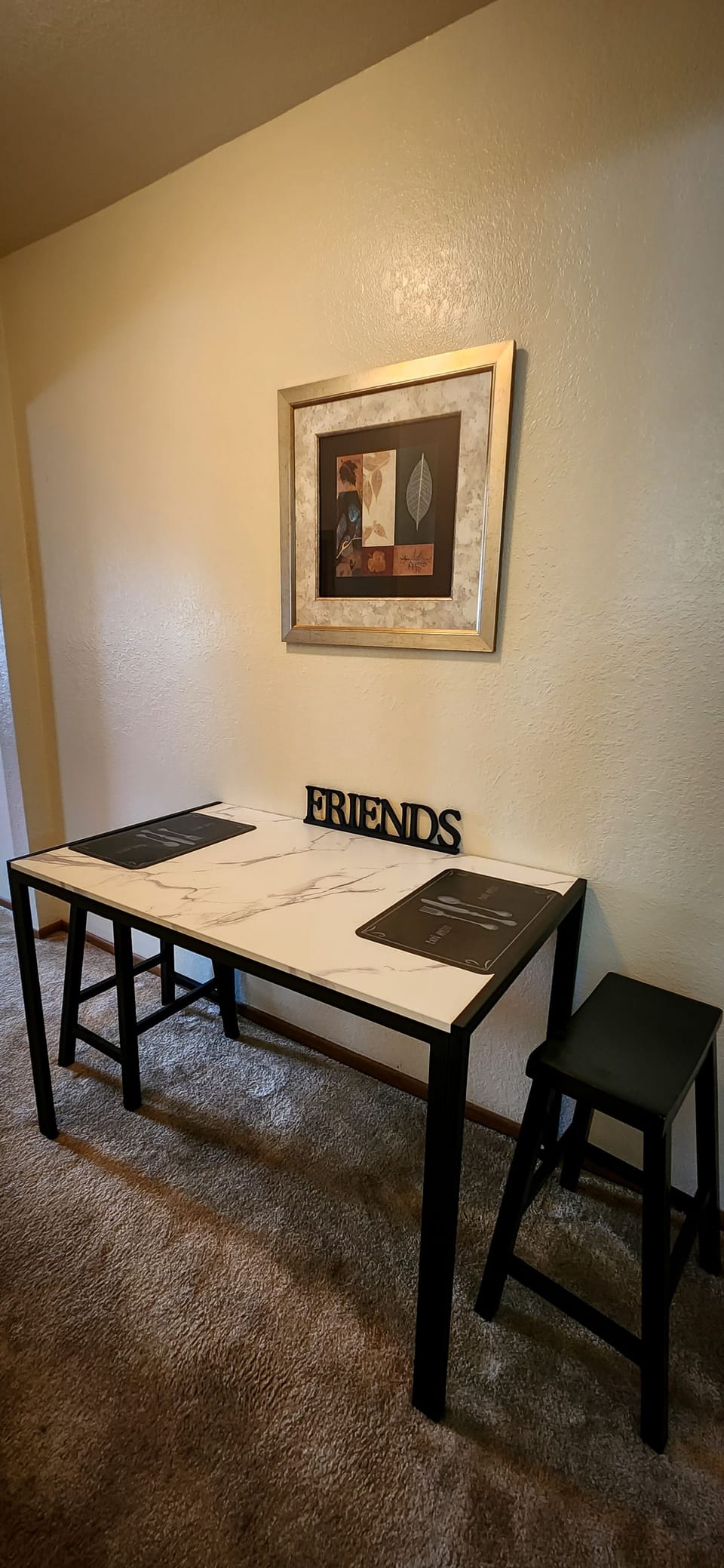 Dining room table comes has 2 stools.