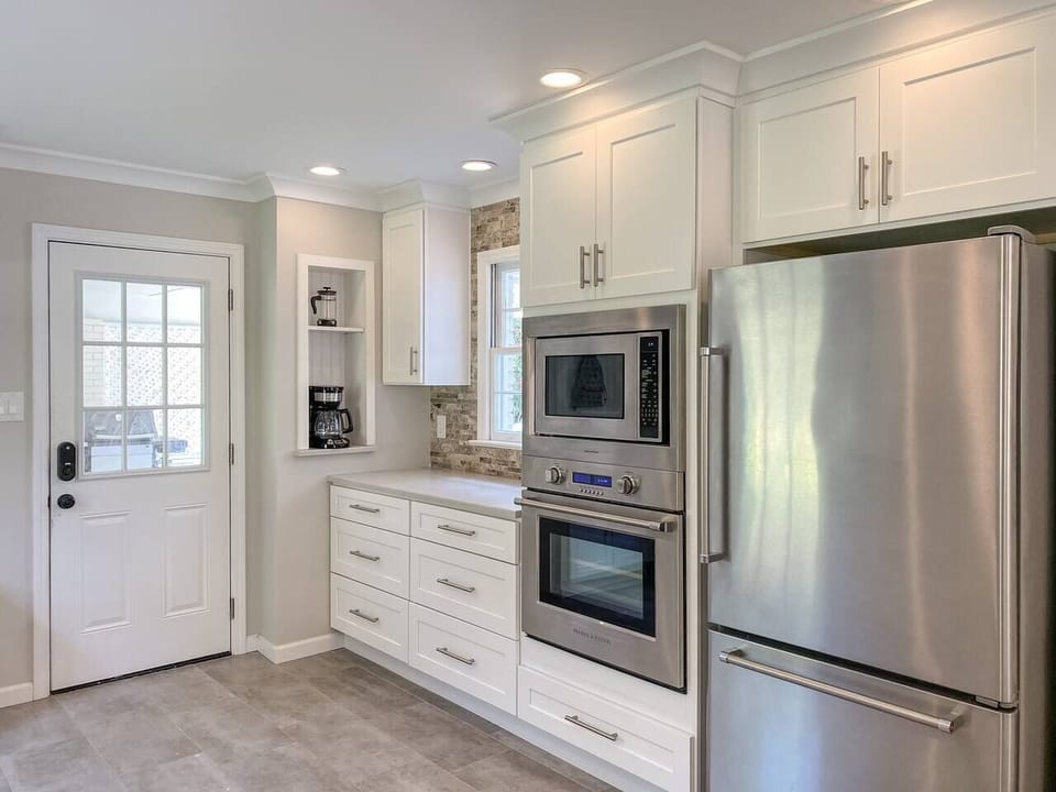 Another view of the kitchen with plenty of storage.