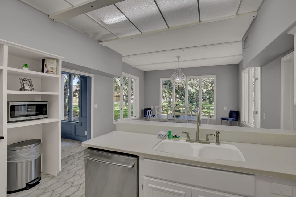 Kitchen with view of oak grove