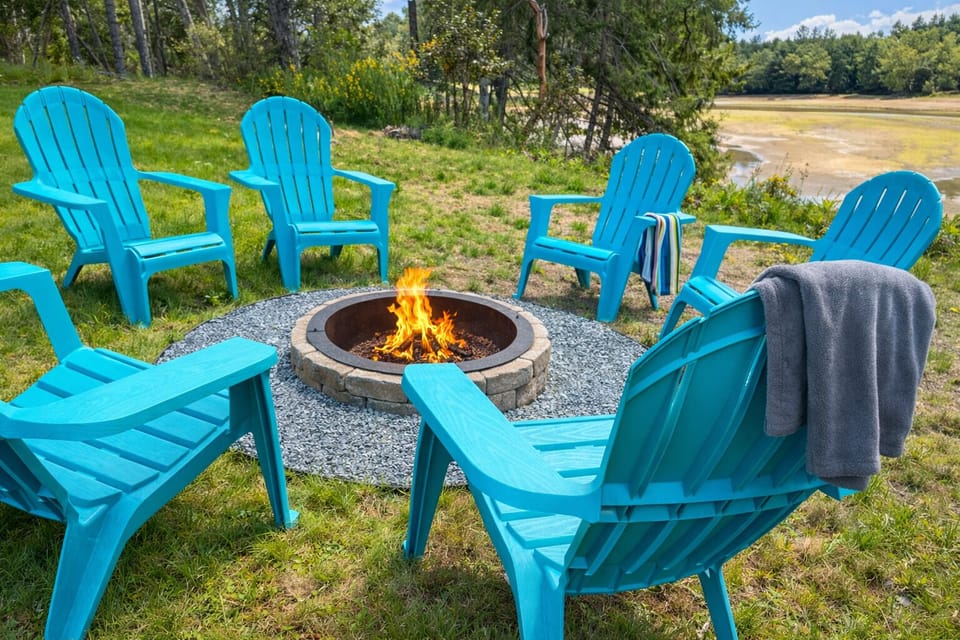 Gather around the fire pit overlooking the tidal bay- perfect for evenings