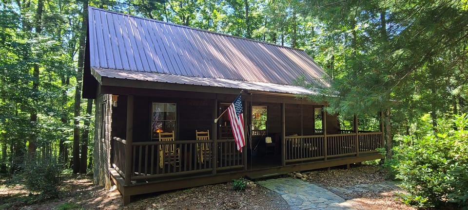 Cabin in a peaceful setting.