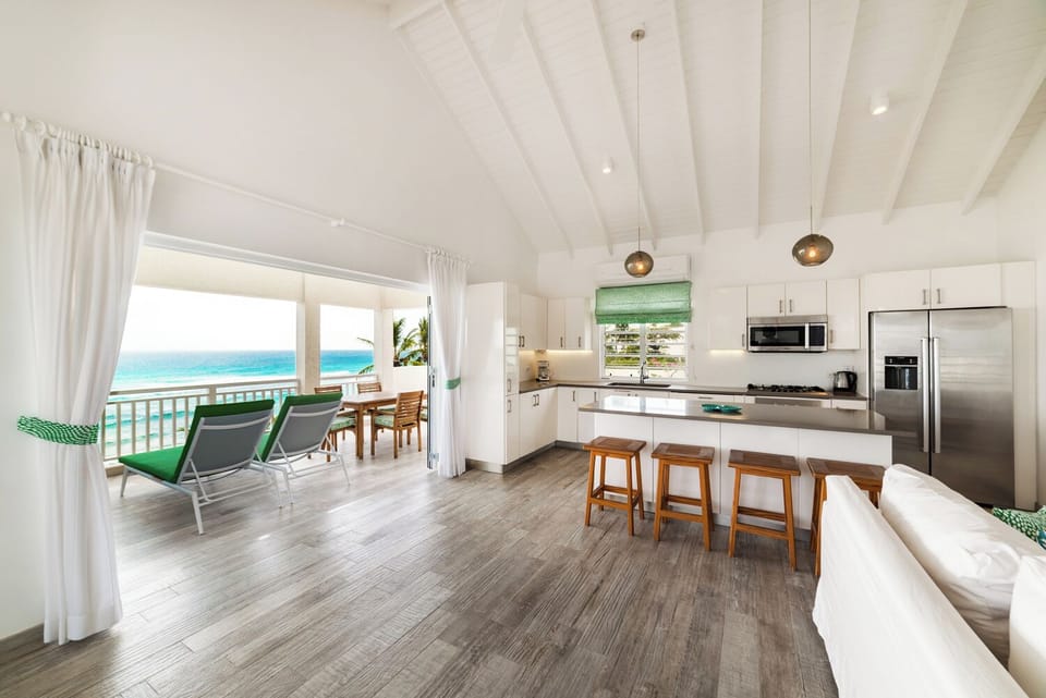 Open area showing kitchen and patio