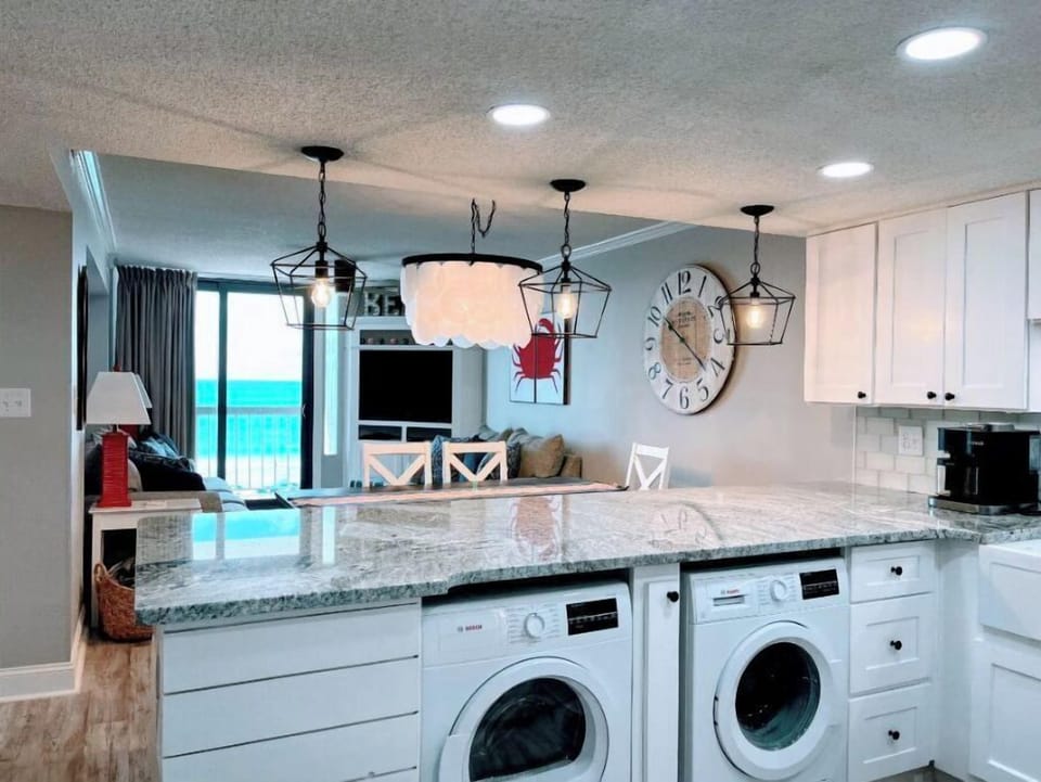Kitchen With Washer And Dryer
