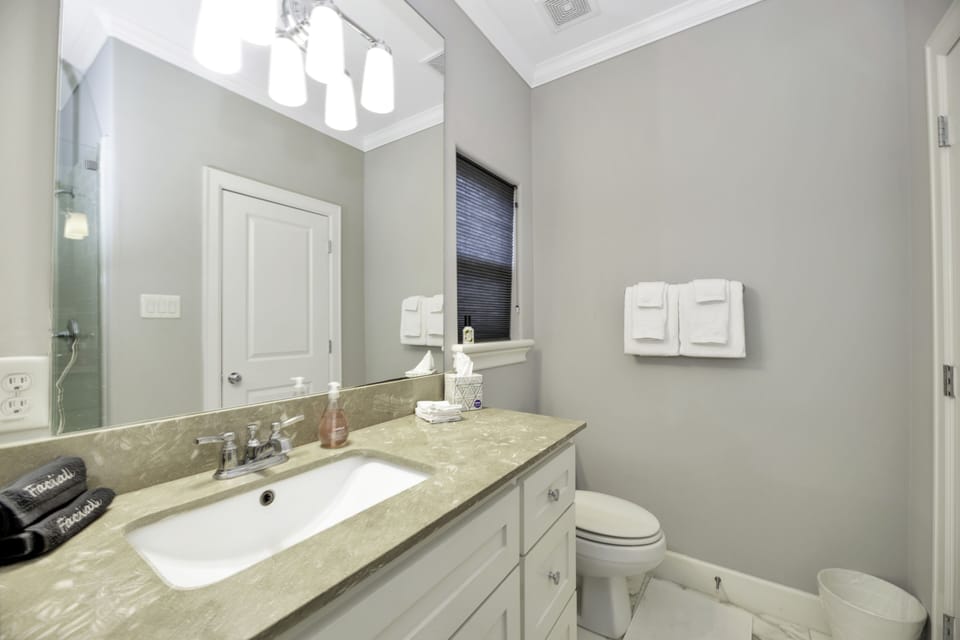 En-suite bathroom with large closet