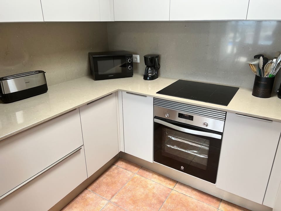 New kitchen with new appliances and granite worktop