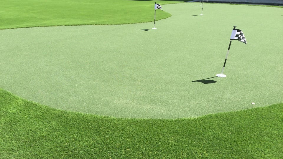 Outdoor putting green and activity area on-site.