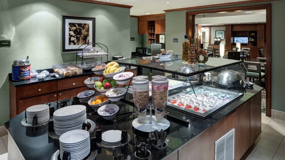 FREE BREAKFAST! Indulge in a delightful breakfast spread with fresh fruits and baked goods, fueling your adventures.