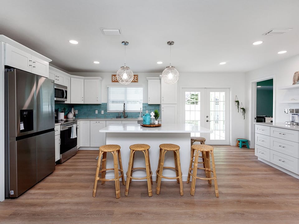 gorgeous kitchen that is fully stocked and has ability to seat 5 at the island.