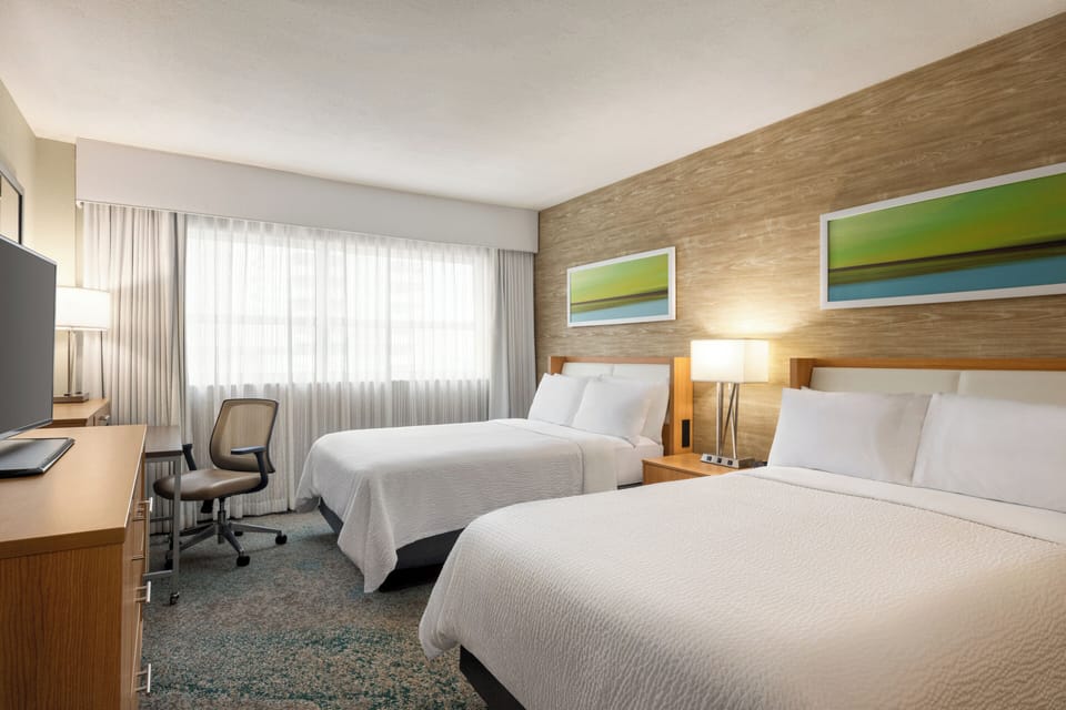 Unit with 2 Double Beds. Exact unit will be assigned upon arrival. Views, colors and decor may vary.