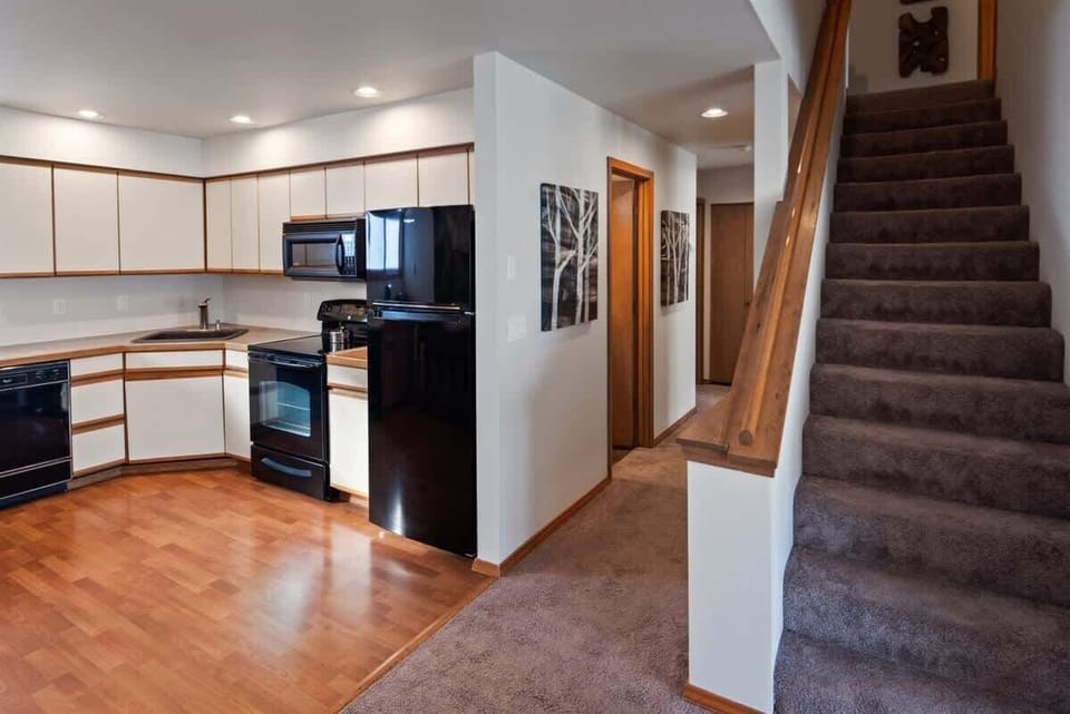 Head upstairs to access 3rd bedroom and lofted sitting area.