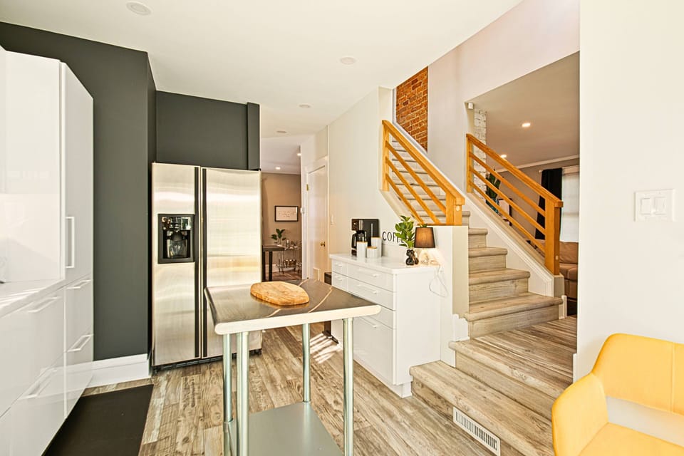 Open layout, upstairs office, free parking for 3 cars - families love it! 
