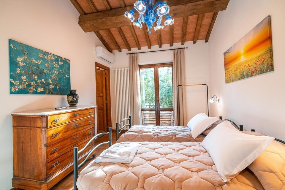 Twin bedroom with en suite bathroom and A/C