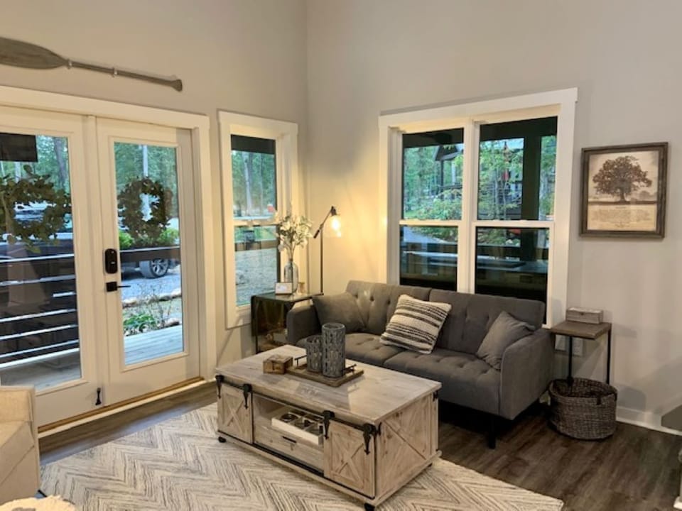 Futon Couch with water view outside to Veranda