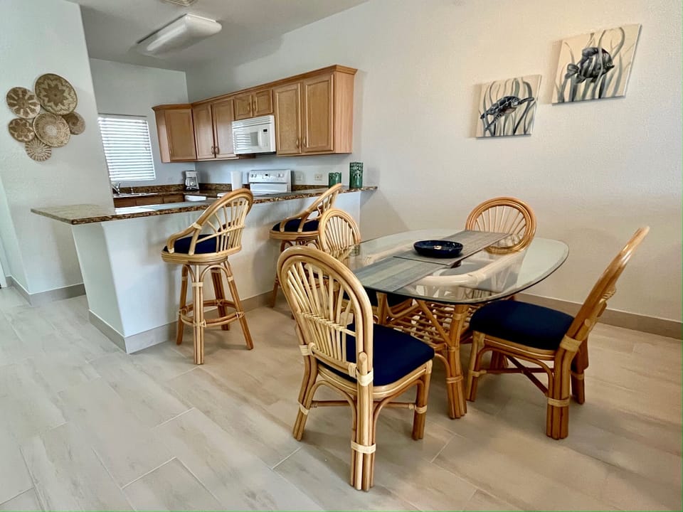 Kitchen can serve to either the convenient bar top or seated dining area.