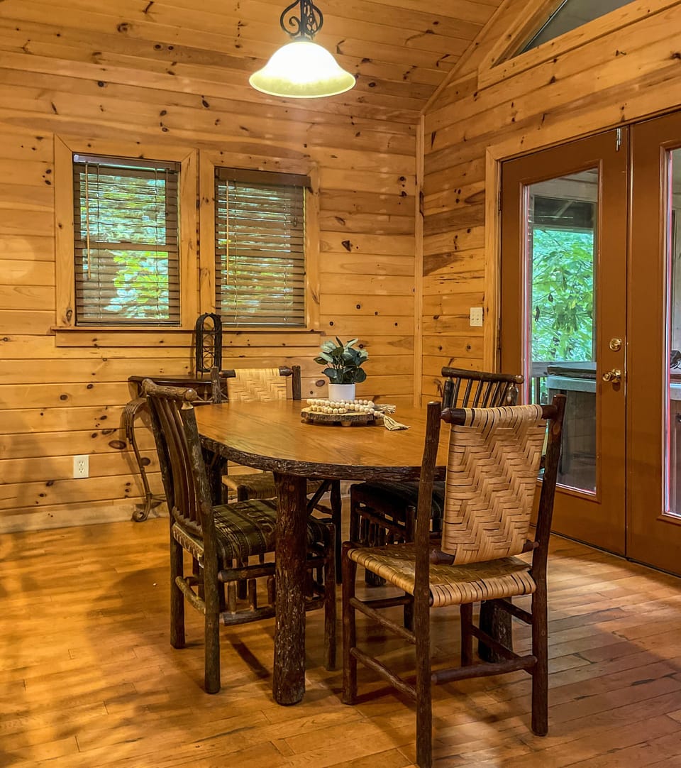 Dining area with additional bar seating on the kitchen island