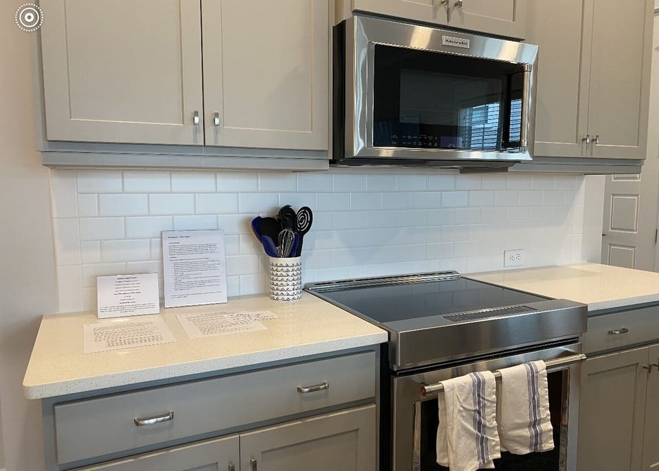 Beautiful Kitchen with island, upgraded appliances, utensils  and 3 bar stools. 