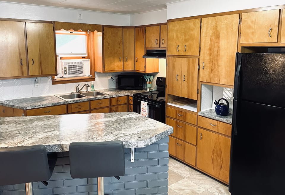 Fully stocked kitchen for cooking and dining in
