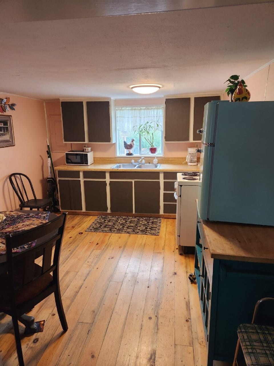 Kitchen, a small retro frig., we also have a cooler if needed.  Coffee too.