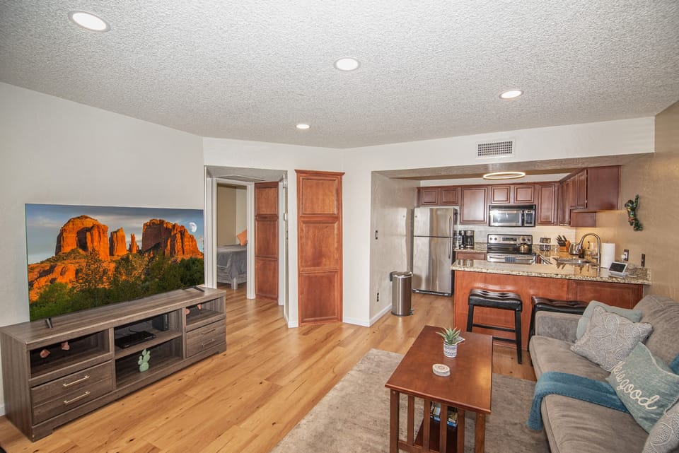 This condo features an open layout. Each bedroom has its own door for privacy.
