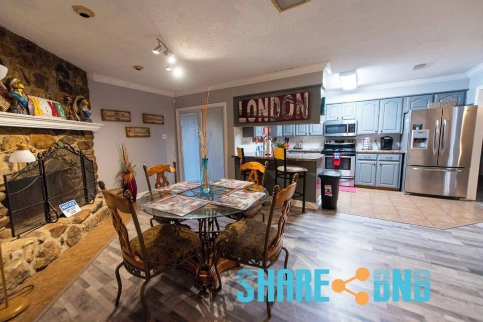 Serving those tasty delicacies was never more accessible as the dining table was next to the kitchen.
