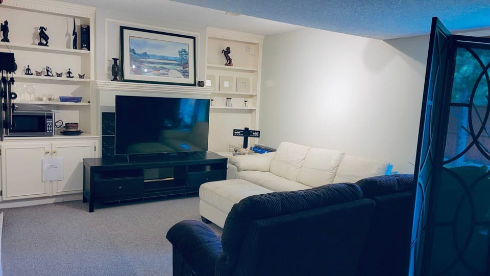 Living Room with 55”TV, Recliner couch, microwave , Coffee Machine, Toaster oven