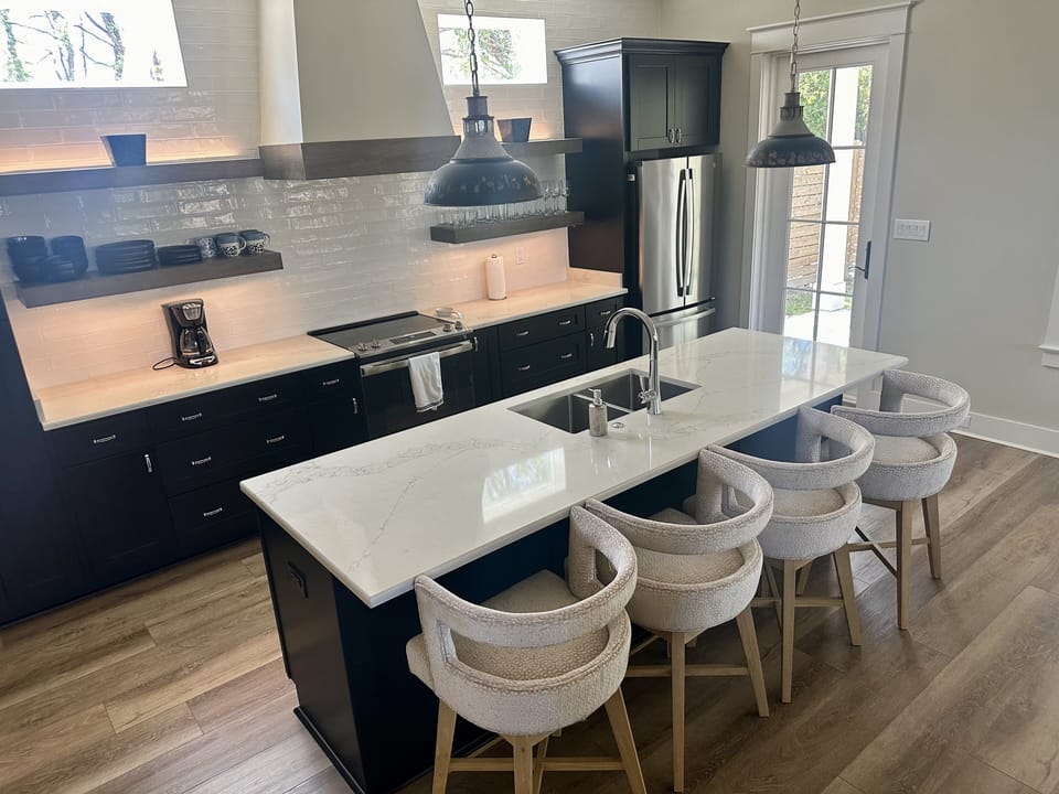 Kitchen island to provide space for cooking, when not dining out