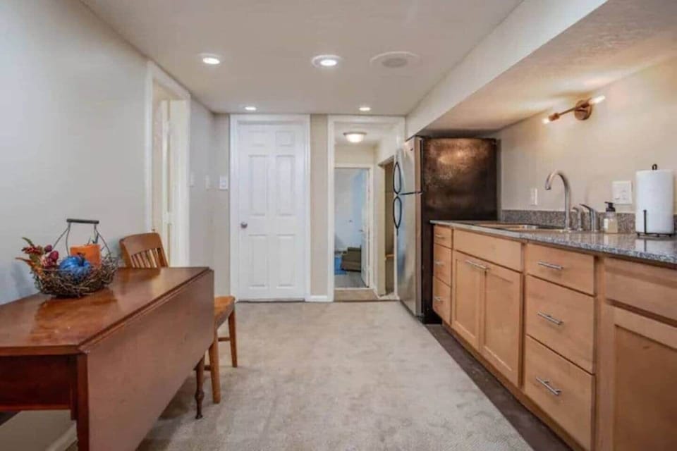 The large Kitchenette in the Lower Level provides an extra work space & freezer. (Sorry...fridge is locked.) There's also some silverware if kids want to have pizza downstairs. 