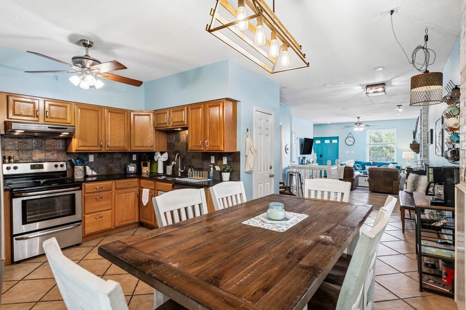 The eat-in Kitchen seats 6 (there's TV trans in Liv Rm closet), place settings for 10, and more!