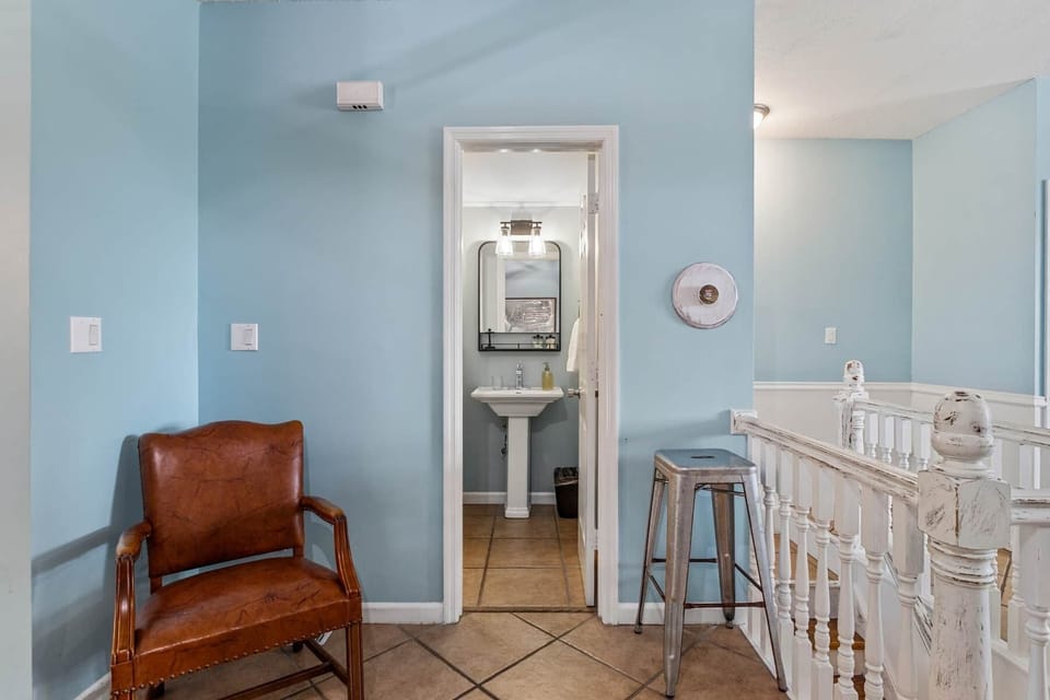 The 4th Full Bath is located at center of Main Level; no need to climb stairs.