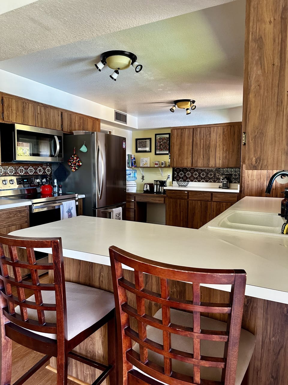 Well appointed kitchen with window overlooking back yard