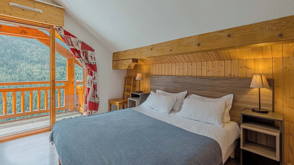 Relax on the comfy bed after a day outside.