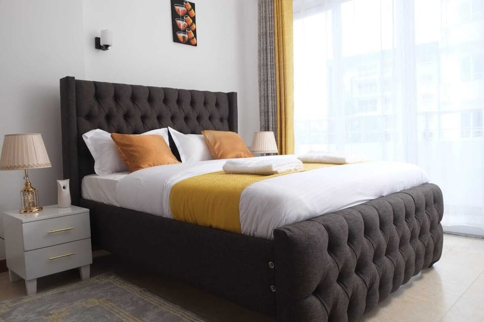 Comfy Queen bed fitted with cotton Duvet, sleep tight mattress, side bed light