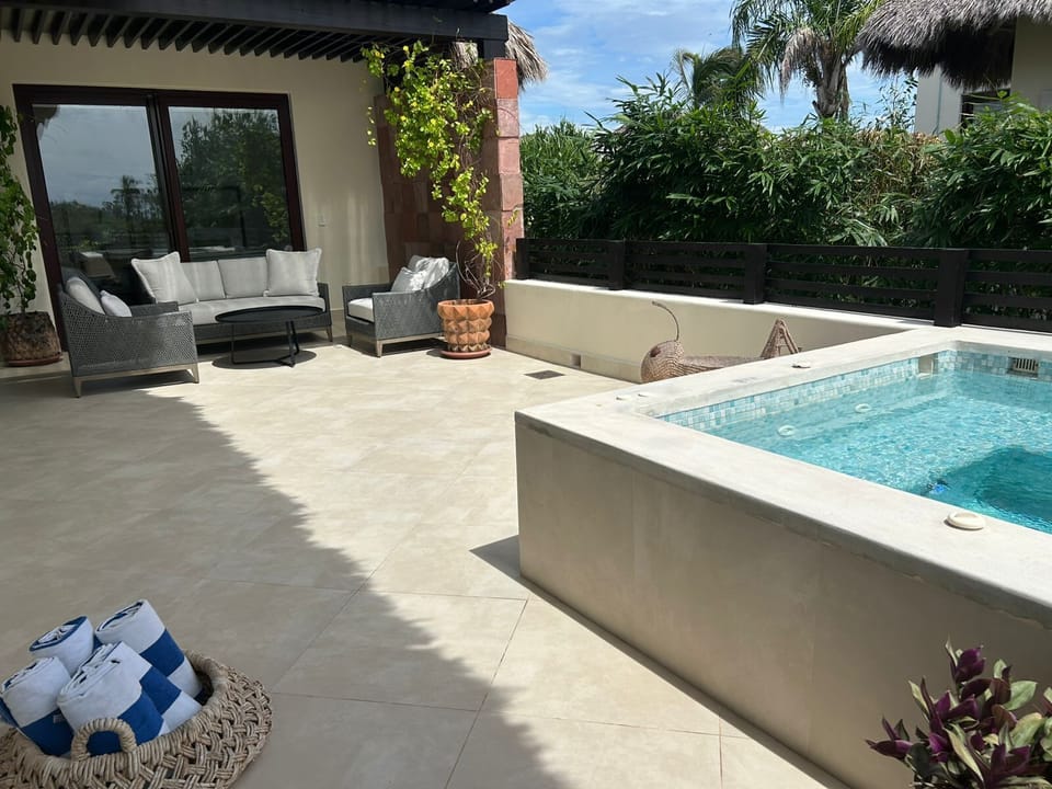 Private jacuzzi for relaxing after the beach or golf