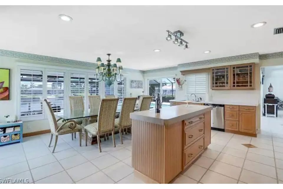 Kitchen center island is expansive with abundant counterspace and drawers.
