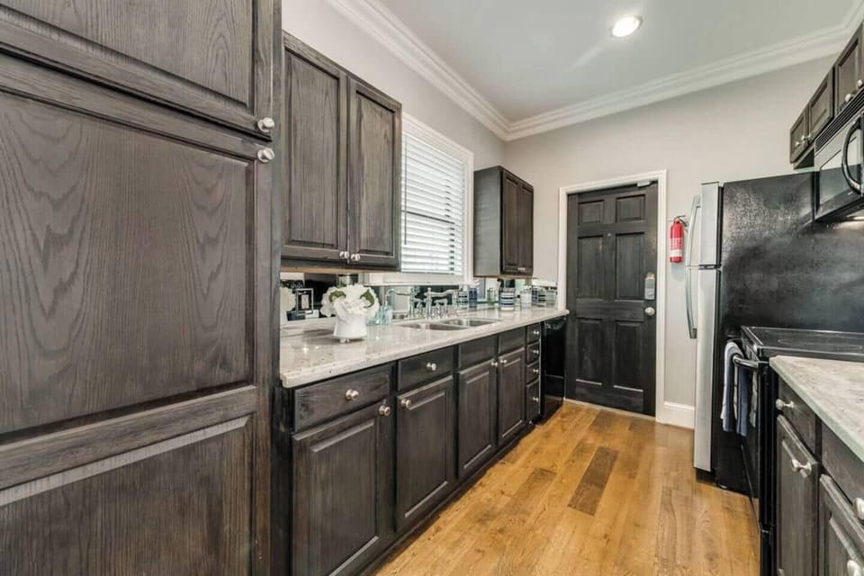 The kitchen is well-appointed with modern appliances, and all the essentials for preparing a great meal.