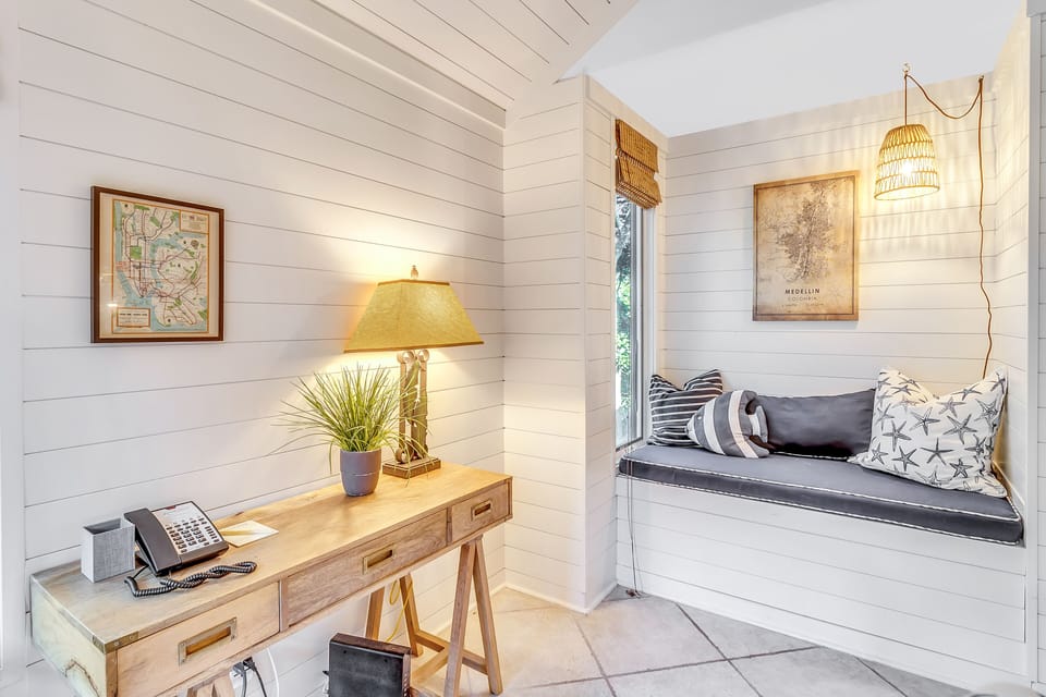 Office space and bench for lounging.
