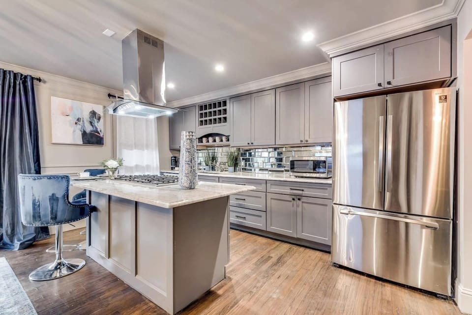 All of our kitchens feature brand new stainless steel appliances, microwave, both Nespresso and drip coffee makers.