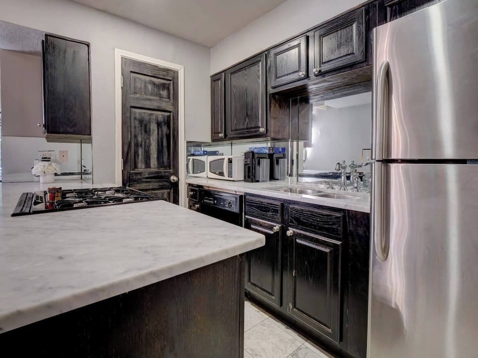 Complete Convenience – Gas stove, microwave, and Nespresso machine for easy meal prep.
