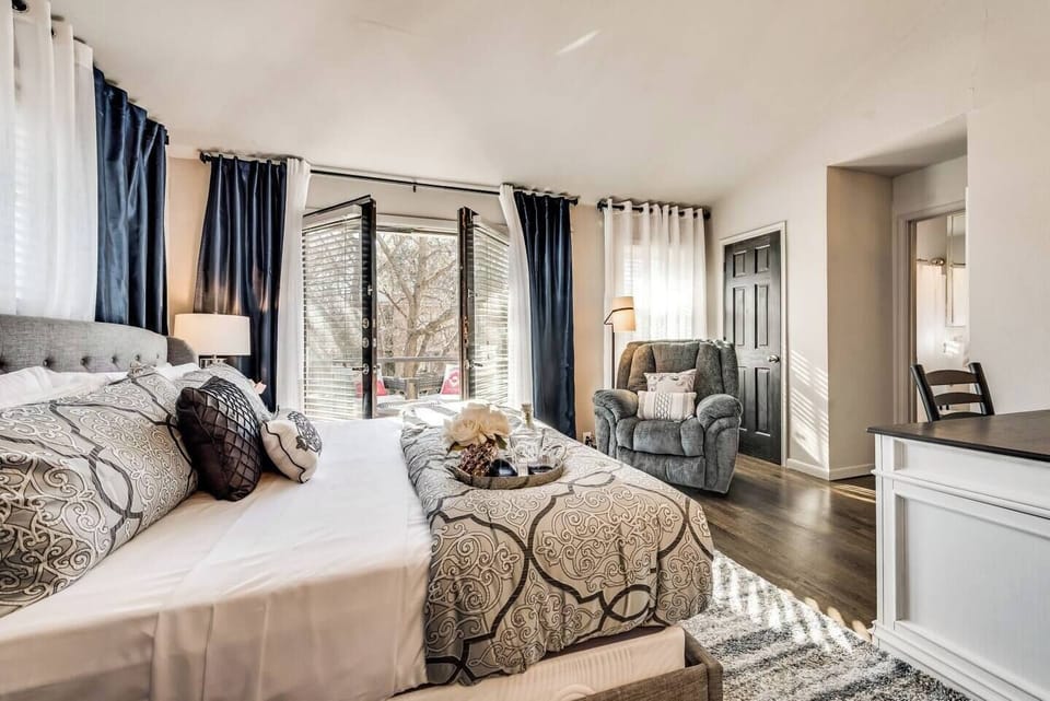 Open up the French doors and let the fresh air in from our beautiful historic neighborhood seen from your personal balcony.