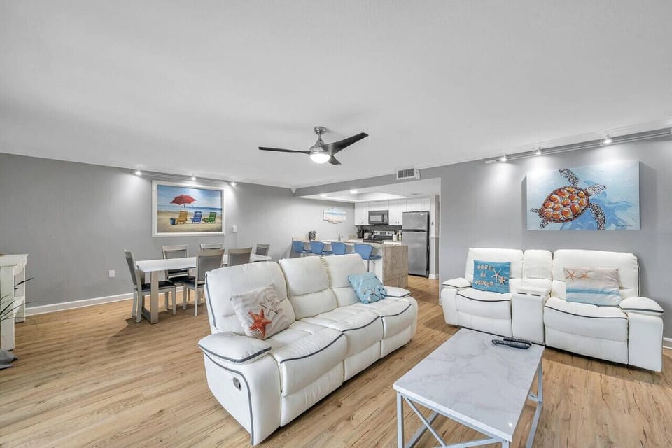 Spacious open-concept living & dining area designed for gathering & unwinding.