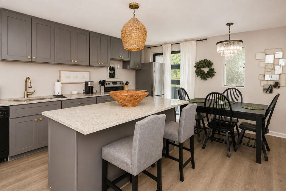 Spacious open floor plan with a large kitchen island, perfect for cooking, dinning and socializing 