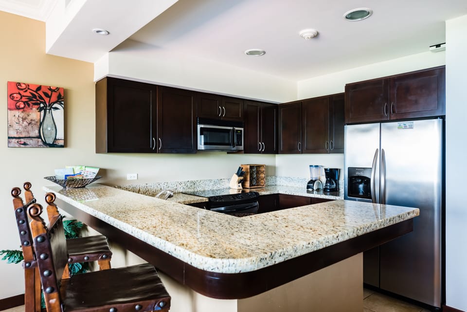 Spacious full kitchen with granite countertops