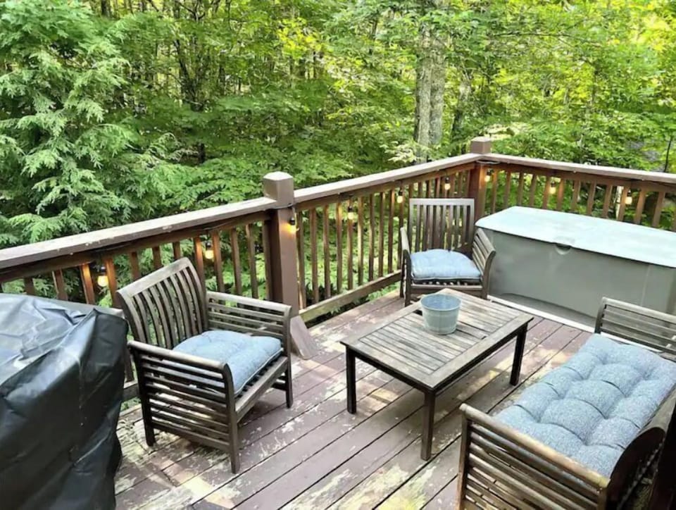 Main level back deck.  Listen to Pond Creek!  Please return dry cushions to bin.